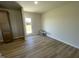 Laundry area with vinyl flooring and exterior access at 39 Harvest Hills Ln, Dunn, NC 28334