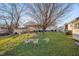 Spacious backyard with covered patio and open grassy area at 505 Forrest St, Hillsborough, NC 27278