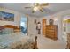 Bright bedroom with a double bed and wood dresser at 505 Forrest St, Hillsborough, NC 27278