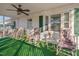 Relaxing front porch with rocking chairs, perfect for enjoying the outdoors at 505 Forrest St, Hillsborough, NC 27278