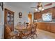 Eat-in kitchen with wood cabinets and a round dining table at 505 Forrest St, Hillsborough, NC 27278