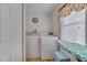 Laundry room with washer, dryer, and window at 505 Forrest St, Hillsborough, NC 27278