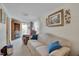 Living room with sofa, recliner, and built-in shelving at 505 Forrest St, Hillsborough, NC 27278