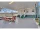 Covered patio with seating area, adjacent to the house at 505 Forrest St, Hillsborough, NC 27278