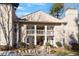 Condo building exterior, showing walkway, stairs, and landscaping at 514 New Kent Pl, Cary, NC 27511