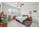 Well-lit bedroom with a queen-size bed and plenty of space at 524 Brunello Dr, Wake Forest, NC 27587