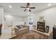 Spacious bonus room with cozy seating area and built-in bookcase at 524 Brunello Dr, Wake Forest, NC 27587