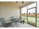 Screened porch overlooks backyard with wooden fence at 524 Brunello Dr, Wake Forest, NC 27587