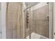 Clean shower with tiled walls and glass enclosure at 524 Brunello Dr, Wake Forest, NC 27587
