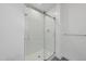 Modern shower stall with glass door and white tile surround at 615 Daniels St # 316, Raleigh, NC 27605
