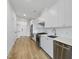 Modern kitchen featuring stainless steel appliances, white cabinets, and granite countertops at 615 Daniels St # 316, Raleigh, NC 27605