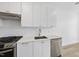 Bright modern kitchen showcasing stainless steel appliances, gas range, and ample counter space at 615 Daniels St # 316, Raleigh, NC 27605