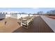 A spacious rooftop deck with outdoor seating offers an inviting place to relax and enjoy the views at 615 Daniels St # 316, Raleigh, NC 27605