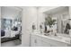 Bathroom with double vanity, large mirror, and shower at 64 Tributary Way, Fuquay Varina, NC 27526