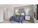Bedroom with a space-themed comforter and large window at 64 Tributary Way, Fuquay Varina, NC 27526