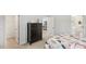 Bedroom with floral comforter and walk-in closet at 64 Tributary Way, Fuquay Varina, NC 27526