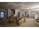Open-concept space under construction showcasing stairs, kitchen cabinets, and an arched doorway at 6805 Greystone Dr, Raleigh, NC 27615