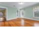 Bright bedroom with hardwood floors and an ensuite bathroom at 804 W Davis St, Burlington, NC 27215