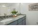 Bathroom featuring double vanity, granite countertop, and modern fixtures at 811 Oxbow Crossing Rd, Chapel Hill, NC 27516