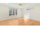 Bright and airy bedroom features hardwood floors, large windows, and natural light at 811 Oxbow Crossing Rd, Chapel Hill, NC 27516
