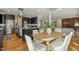 Spacious kitchen with large island, stainless steel appliances and hardwood floors at 811 Oxbow Crossing Rd, Chapel Hill, NC 27516