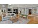 Comfortable living room with open floor plan and connection to the kitchen area at 811 Oxbow Crossing Rd, Chapel Hill, NC 27516
