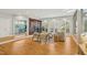 Cozy living room with fireplace, built-in shelving, and natural light from large windows at 811 Oxbow Crossing Rd, Chapel Hill, NC 27516