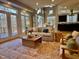 Open-concept living area with views into the kitchen and a cozy seating arrangement at 811 Oxbow Crossing Rd, Chapel Hill, NC 27516