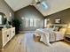 Comfortable and dark bedroom featuring neutral tones and a warm ambiance at 811 Oxbow Crossing Rd, Chapel Hill, NC 27516