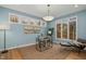 Stylish home office with multiple windows, modern desk, and comfortable seating at 811 Oxbow Crossing Rd, Chapel Hill, NC 27516