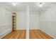 Spacious walk-in closet features built-in shelves, ample storage and hardwood floors at 811 Oxbow Crossing Rd, Chapel Hill, NC 27516