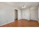 Bedroom with wood floors, double closets and ceiling fan at 813 Starfield Ct, Fuquay Varina, NC 27526