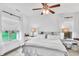 Comfortable bedroom with ceiling fan, large window, and ample light at 151 Crosscreek Ln, Angier, NC 27501