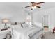 Charming bedroom featuring a ceiling fan and large window at 151 Crosscreek Ln, Angier, NC 27501