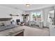 Spacious bedroom with a desk, large window and comfortable bed at 151 Crosscreek Ln, Angier, NC 27501