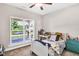 Cozy bedroom with a window overlooking the backyard at 151 Crosscreek Ln, Angier, NC 27501