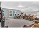 Multipurpose bonus room with couch and workspace at 151 Crosscreek Ln, Angier, NC 27501