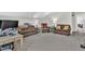 Spacious bonus room with seating area and workspace at 151 Crosscreek Ln, Angier, NC 27501