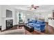 Living area with fireplace, hardwood floors, and dining area view at 151 Crosscreek Ln, Angier, NC 27501