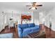 Open living space with hardwood floors and kitchen access at 151 Crosscreek Ln, Angier, NC 27501