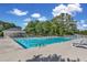 Community pool with lounge chairs and cabana at 151 Crosscreek Ln, Angier, NC 27501