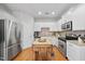 Modern kitchen with stainless steel appliances and granite countertops at 2605 Cloud Mist Cir, Raleigh, NC 27614