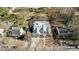 Aerial view of home with neighboring houses, driveway, and mature trees at 3304 Cheswick Dr, Raleigh, NC 27609