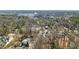 Aerial view of neighborhood with homes, trees, and streets at 3304 Cheswick Dr, Raleigh, NC 27609