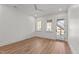 Bright bedroom with hardwood floors, recessed lighting, natural light, and access to an outdoor deck at 3304 Cheswick Dr, Raleigh, NC 27609