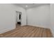 Clean bedroom with hardwood floors, neutral walls, and ample closet space at 3304 Cheswick Dr, Raleigh, NC 27609