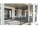 Spacious back deck with sleek railings and overhead fans offer a relaxing outdoor space at 3304 Cheswick Dr, Raleigh, NC 27609