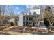 Beautiful two-story home with a modern design, balconies, and a professionally landscaped front yard at 3304 Cheswick Dr, Raleigh, NC 27609