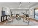 Open concept living area featuring stylish furniture, hardwood floors and plenty of space at 3304 Cheswick Dr, Raleigh, NC 27609