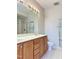Double vanity bathroom with wood cabinets and a shower at 331 Providence Glen Dr, Chapel Hill, NC 27514